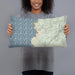 Person holding 20x12 Custom Depoe Bay Oregon Map Throw Pillow in Woodblock