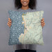 Person holding 18x18 Custom Depoe Bay Oregon Map Throw Pillow in Woodblock
