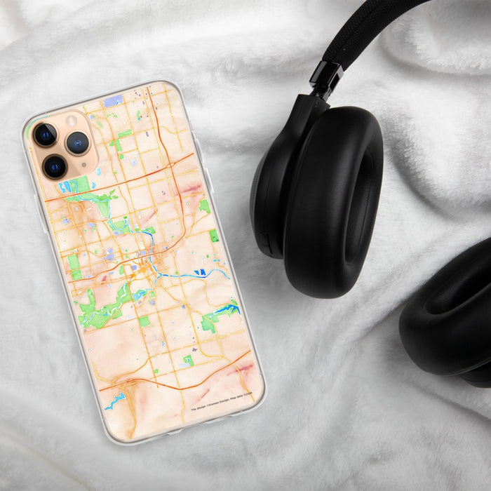 Custom Des Moines Iowa Map Phone Case in Watercolor on Table with Black Headphones