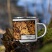 Right View Custom DeSoto Texas Map Enamel Mug in Ember on Grass With Trees in Background