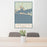 24x36 Destin Florida Map Print Portrait Orientation in Woodblock Style Behind 2 Chairs Table and Potted Plant