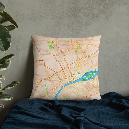 Custom Detroit Michigan Map Throw Pillow in Watercolor on Bedding Against Wall