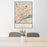 24x36 Detroit Michigan Map Print Portrait Orientation in Woodblock Style Behind 2 Chairs Table and Potted Plant