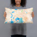 Person holding 20x12 Custom Detroit Lakes Minnesota Map Throw Pillow in Watercolor