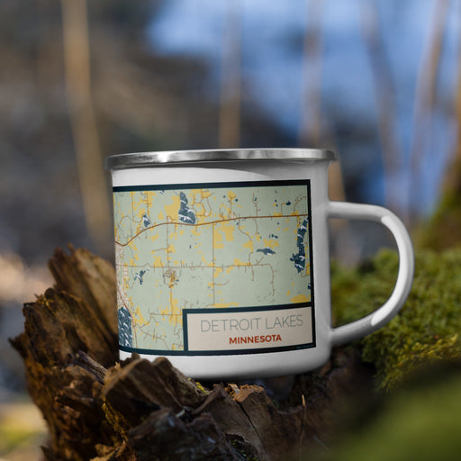 Right View Custom Detroit Lakes Minnesota Map Enamel Mug in Woodblock on Grass With Trees in Background