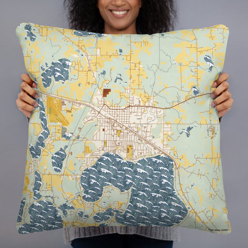 Person holding 22x22 Custom Detroit Lakes Minnesota Map Throw Pillow in Woodblock