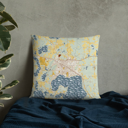 Custom Detroit Lakes Minnesota Map Throw Pillow in Woodblock on Bedding Against Wall