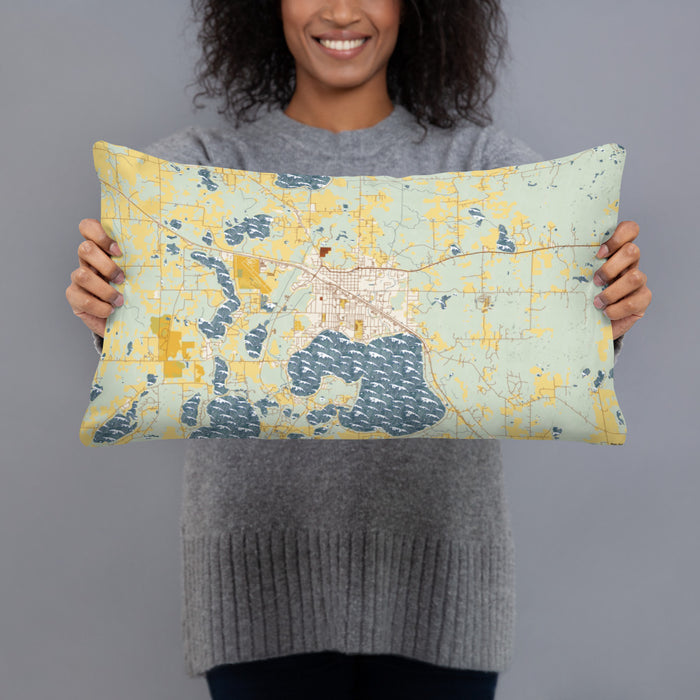 Person holding 20x12 Custom Detroit Lakes Minnesota Map Throw Pillow in Woodblock