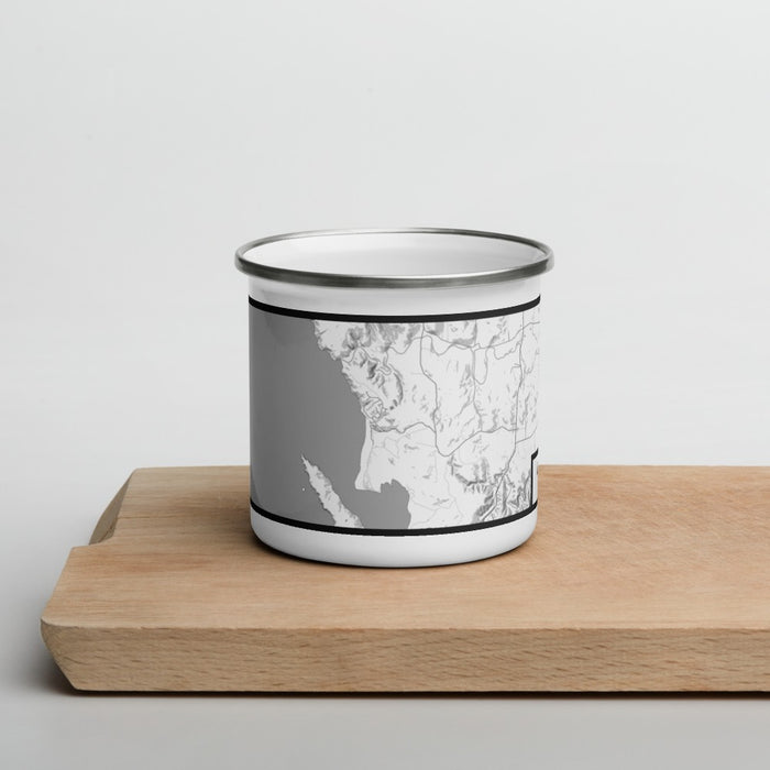 Front View Custom Dillon Beach California Map Enamel Mug in Classic on Cutting Board