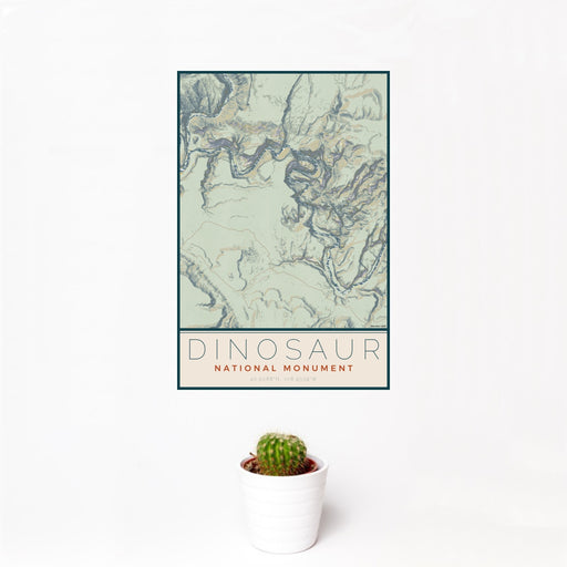 12x18 Dinosaur National Monument Map Print Portrait Orientation in Woodblock Style With Small Cactus Plant in White Planter