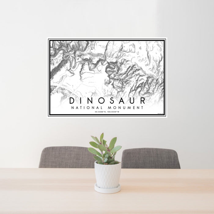 24x36 Dinosaur National Monument Map Print Lanscape Orientation in Classic Style Behind 2 Chairs Table and Potted Plant