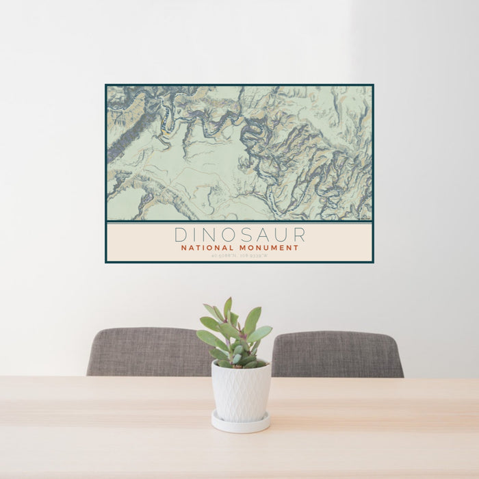24x36 Dinosaur National Monument Map Print Lanscape Orientation in Woodblock Style Behind 2 Chairs Table and Potted Plant