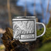 Right View Custom Dinosaur National Monument Map Enamel Mug in Classic on Grass With Trees in Background