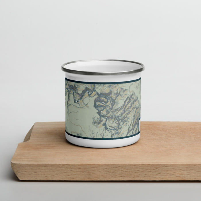 Front View Custom Dinosaur National Monument Map Enamel Mug in Woodblock on Cutting Board