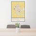 24x36 Dodge City Kansas Map Print Portrait Orientation in Woodblock Style Behind 2 Chairs Table and Potted Plant