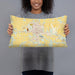 Person holding 20x12 Custom Dodge City Kansas Map Throw Pillow in Woodblock