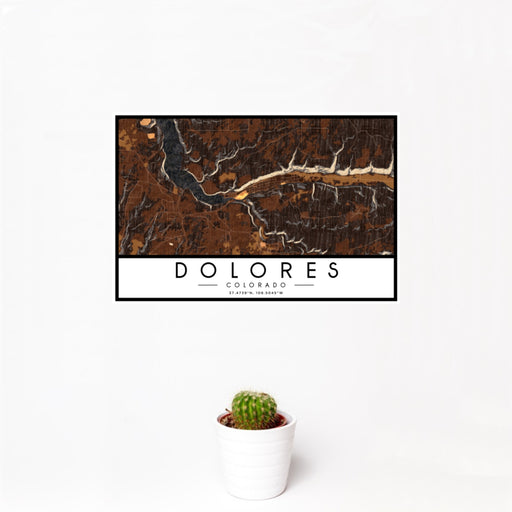 12x18 Dolores Colorado Map Print Landscape Orientation in Ember Style With Small Cactus Plant in White Planter
