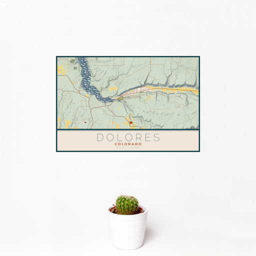 12x18 Dolores Colorado Map Print Landscape Orientation in Woodblock Style With Small Cactus Plant in White Planter