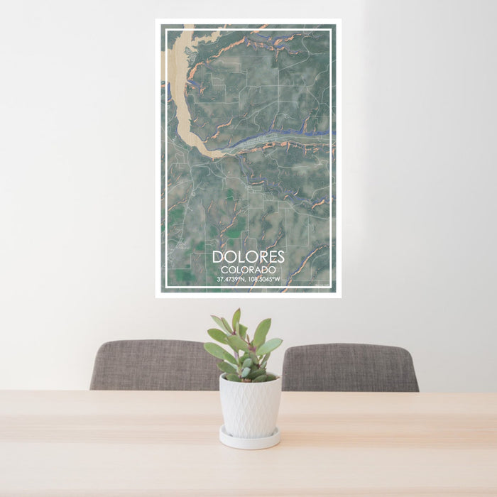 24x36 Dolores Colorado Map Print Portrait Orientation in Afternoon Style Behind 2 Chairs Table and Potted Plant