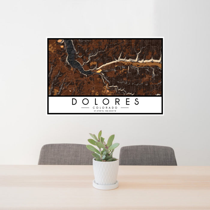 24x36 Dolores Colorado Map Print Lanscape Orientation in Ember Style Behind 2 Chairs Table and Potted Plant