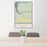 24x36 Dolores Colorado Map Print Portrait Orientation in Woodblock Style Behind 2 Chairs Table and Potted Plant