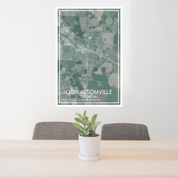 24x36 Donalsonville Georgia Map Print Portrait Orientation in Afternoon Style Behind 2 Chairs Table and Potted Plant
