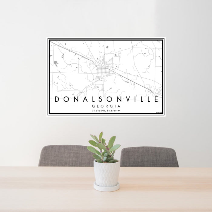 24x36 Donalsonville Georgia Map Print Landscape Orientation in Classic Style Behind 2 Chairs Table and Potted Plant