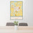 24x36 Donalsonville Georgia Map Print Portrait Orientation in Woodblock Style Behind 2 Chairs Table and Potted Plant