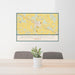 24x36 Donalsonville Georgia Map Print Landscape Orientation in Woodblock Style Behind 2 Chairs Table and Potted Plant