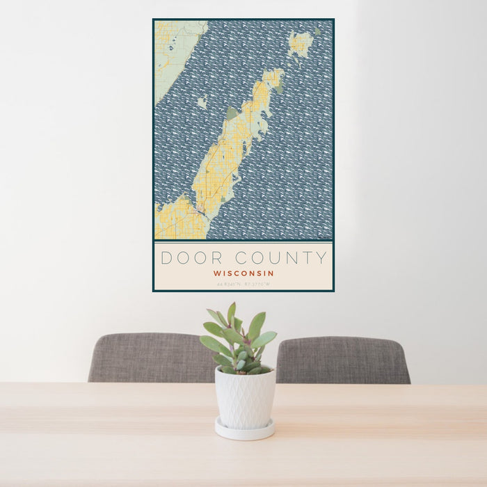 24x36 Door County Wisconsin Map Print Portrait Orientation in Woodblock Style Behind 2 Chairs Table and Potted Plant