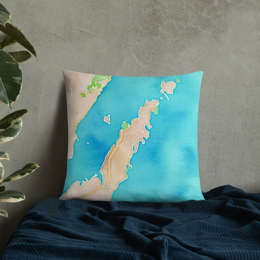 Custom Door County Wisconsin Map Throw Pillow in Watercolor on Bedding Against Wall