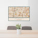 24x36 Downey California Map Print Lanscape Orientation in Woodblock Style Behind 2 Chairs Table and Potted Plant