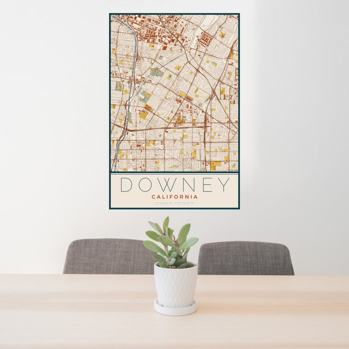 24x36 Downey California Map Print Portrait Orientation in Woodblock Style Behind 2 Chairs Table and Potted Plant