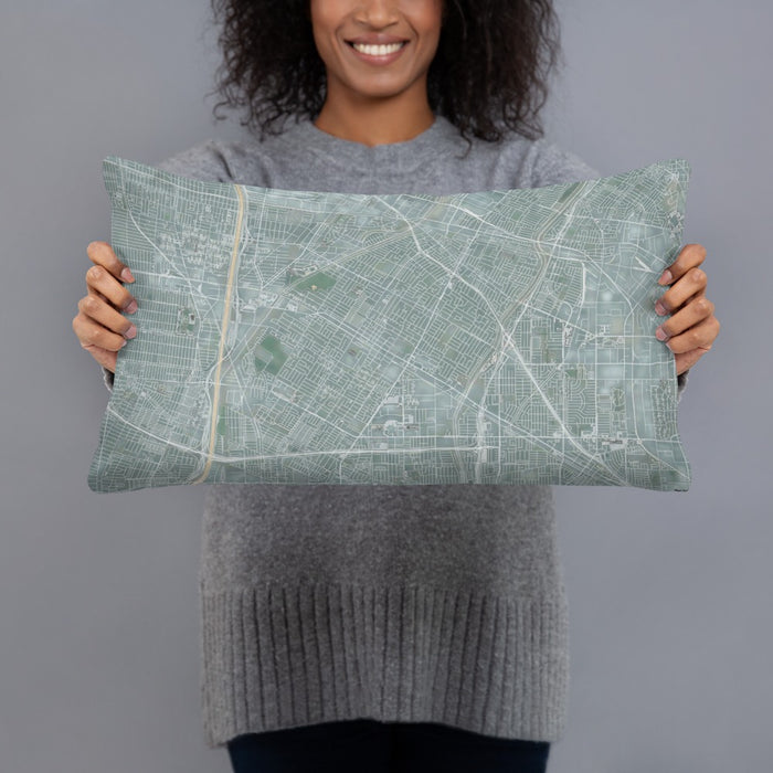 Person holding 20x12 Custom Downey California Map Throw Pillow in Afternoon