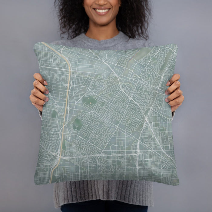 Person holding 18x18 Custom Downey California Map Throw Pillow in Afternoon