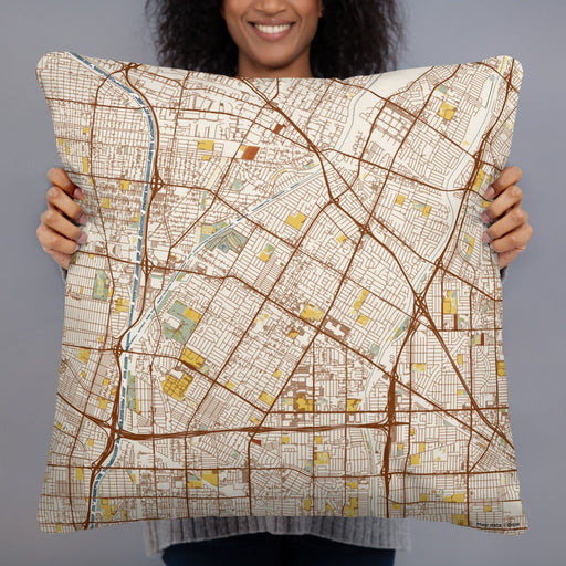Person holding 22x22 Custom Downey California Map Throw Pillow in Woodblock