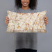 Person holding 20x12 Custom Downey California Map Throw Pillow in Woodblock
