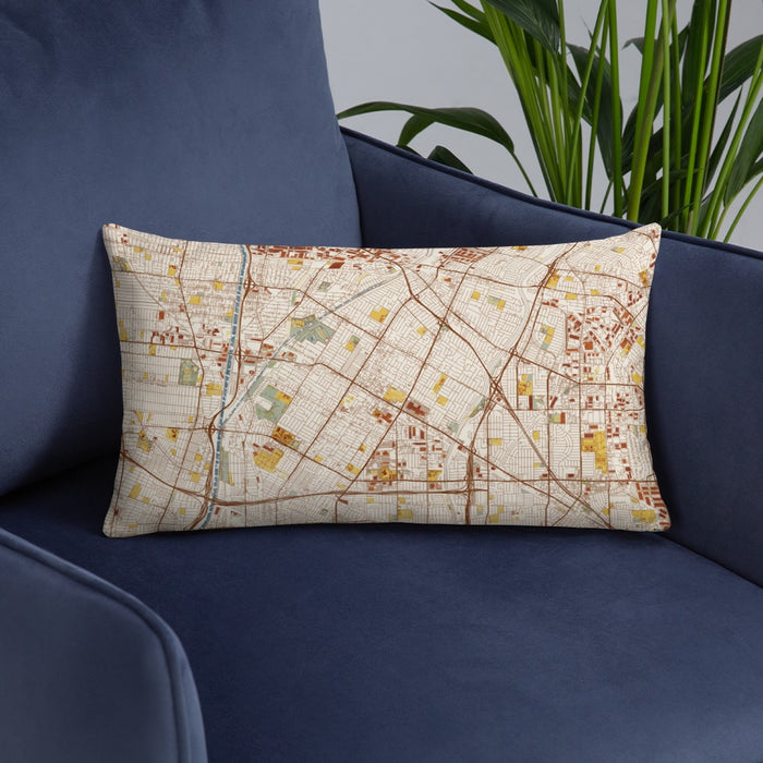 Custom Downey California Map Throw Pillow in Woodblock on Blue Colored Chair