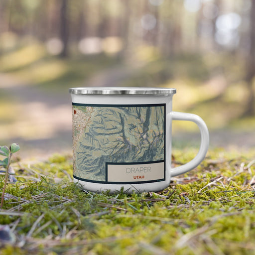 Right View Custom Draper Utah Map Enamel Mug in Woodblock on Grass With Trees in Background