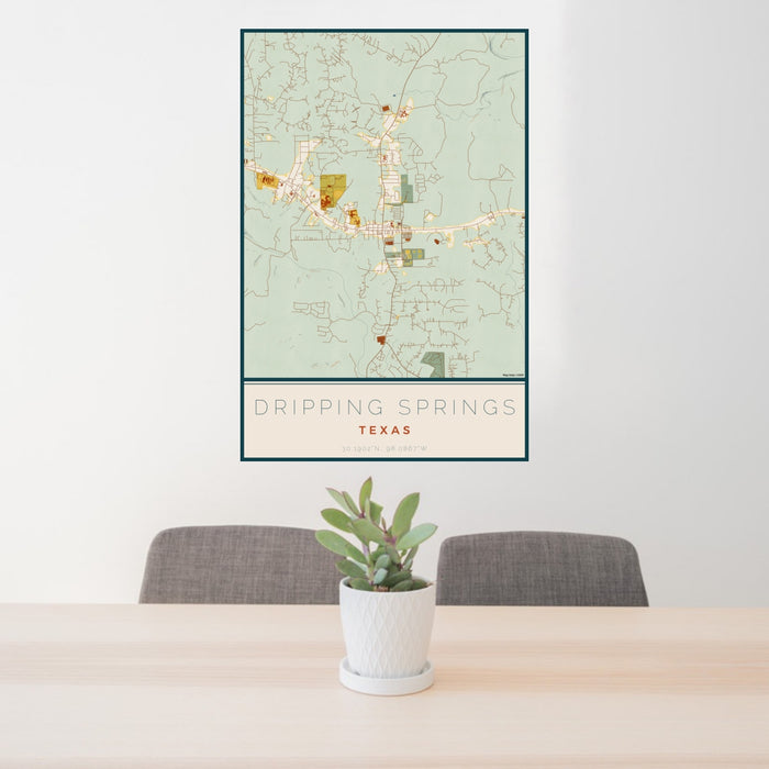 24x36 Dripping Springs Texas Map Print Portrait Orientation in Woodblock Style Behind 2 Chairs Table and Potted Plant