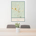 24x36 Dripping Springs Texas Map Print Portrait Orientation in Woodblock Style Behind 2 Chairs Table and Potted Plant