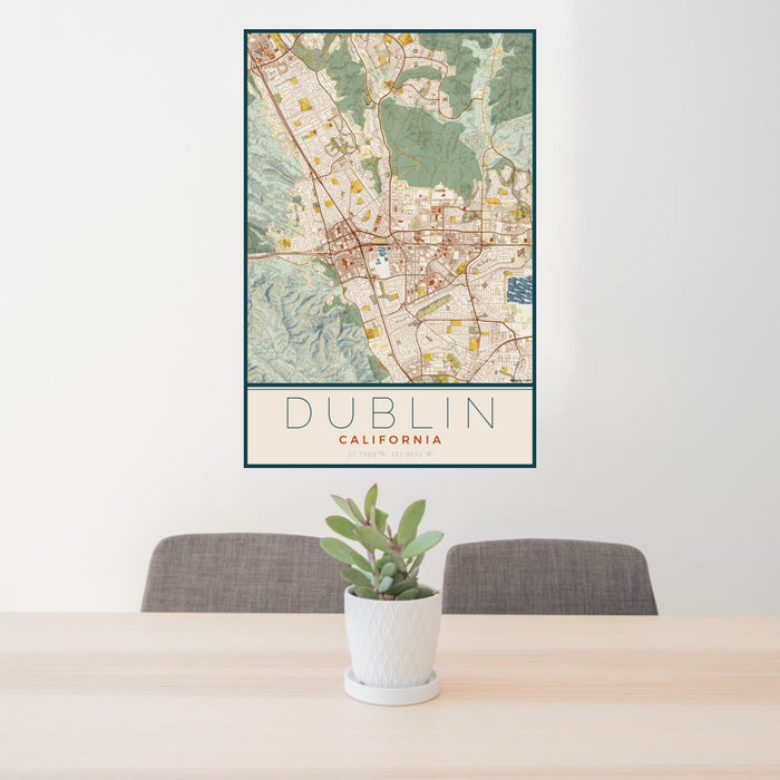 24x36 Dublin California Map Print Portrait Orientation in Woodblock Style Behind 2 Chairs Table and Potted Plant