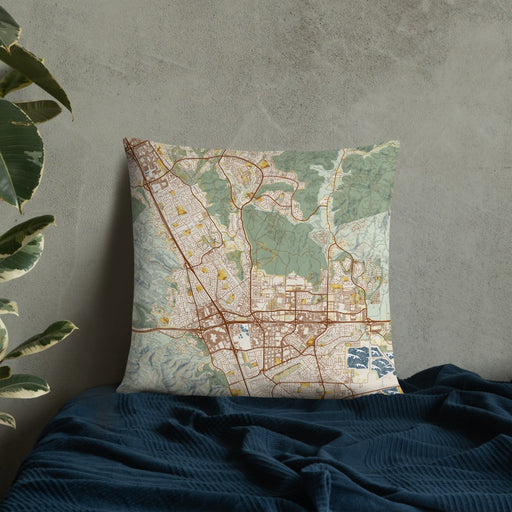 Custom Dublin California Map Throw Pillow in Woodblock on Bedding Against Wall