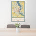 24x36 Dubuque Iowa Map Print Portrait Orientation in Woodblock Style Behind 2 Chairs Table and Potted Plant