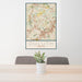 24x36 Duluth Georgia Map Print Portrait Orientation in Woodblock Style Behind 2 Chairs Table and Potted Plant