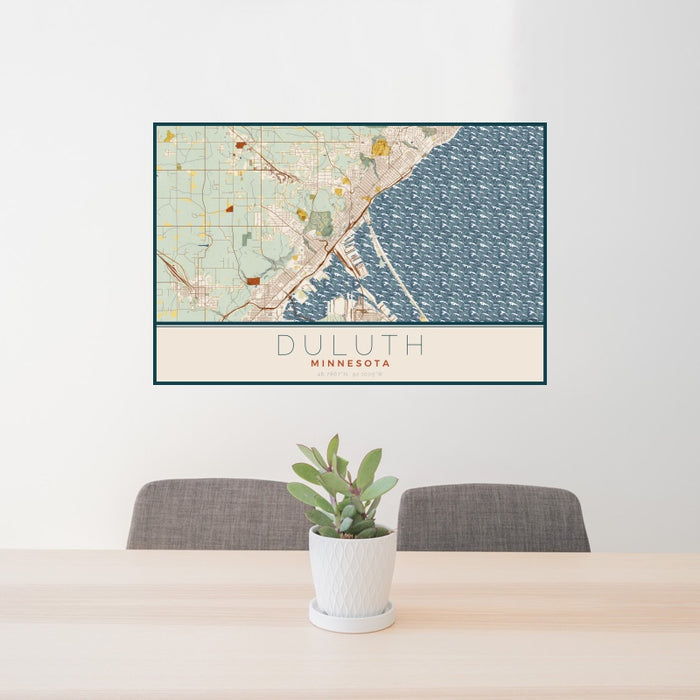 24x36 Duluth Minnesota Map Print Landscape Orientation in Woodblock Style Behind 2 Chairs Table and Potted Plant