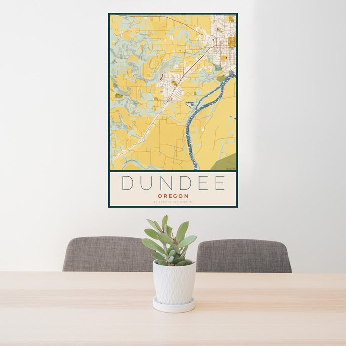 24x36 Dundee Oregon Map Print Portrait Orientation in Woodblock Style Behind 2 Chairs Table and Potted Plant