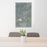 24x36 Durango Colorado Map Print Portrait Orientation in Afternoon Style Behind 2 Chairs Table and Potted Plant