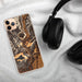 Custom Durango Colorado Map Phone Case in Ember on Table with Black Headphones