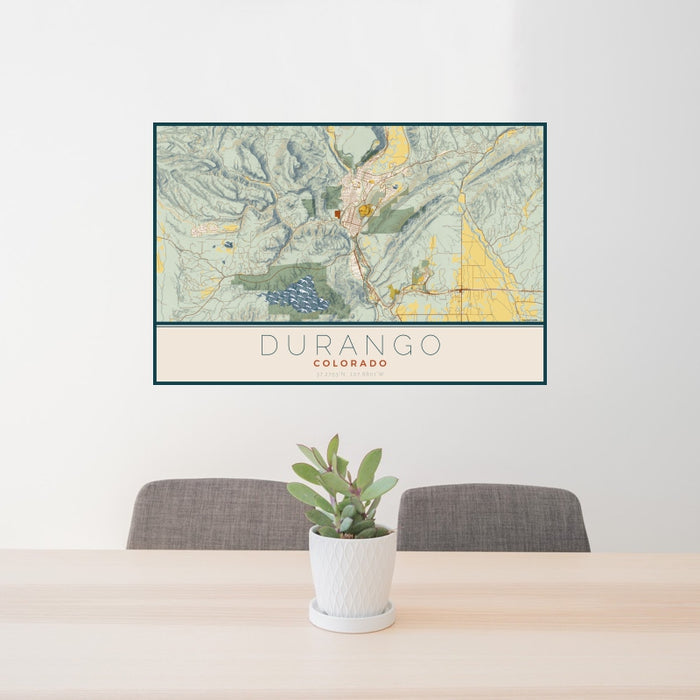 24x36 Durango Colorado Map Print Landscape Orientation in Woodblock Style Behind 2 Chairs Table and Potted Plant
